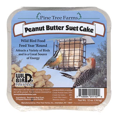 Square suet cake labeled “Peanut Butter Suet Dough” in clear packaging, showing a bird enjoying suet from a wire feeder. Packed with peanut butter and peanuts, it’s a high-energy treat made for wild birds—perfect for cooler months when extra fuel is needed.